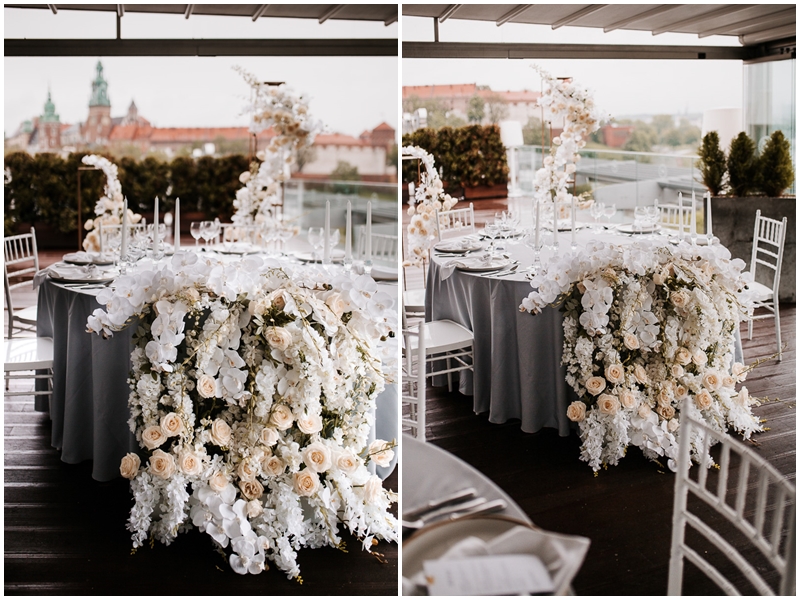 dekoracja stołu Pary Młodej, spływające dekoracje, wesele w sheratonie w krakowie, elegancki slub w bieli, ślub plenerowy na tarasie, wesele na tarasie 